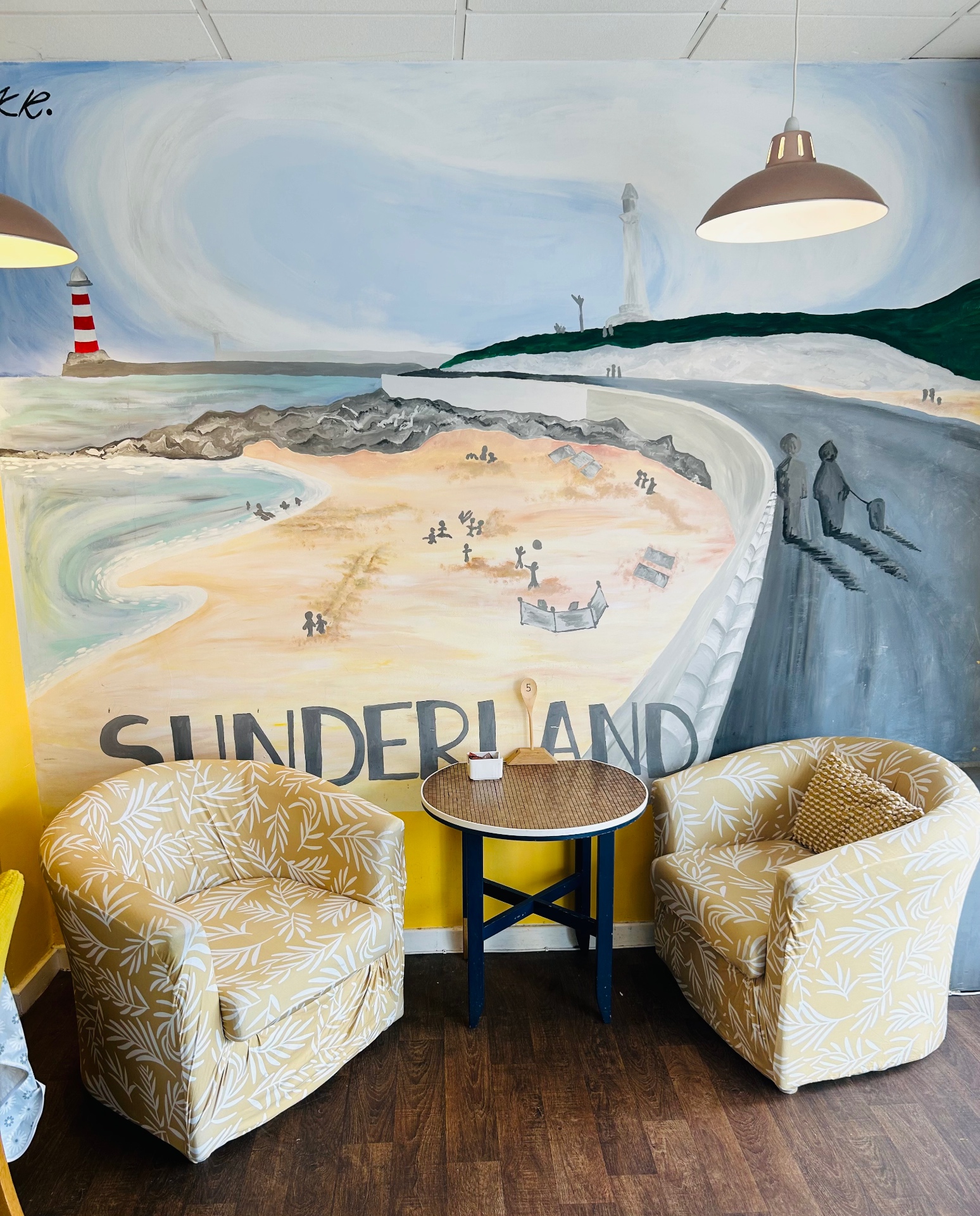 Hand-painted Sunderland seafront mural inside Oscars Coffee House